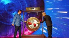 Dr. David Hon, founder and CEO of DAHON, rings the Listing Gong