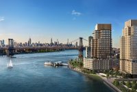 One Williamsburg Wharf rises along Brooklyn's East River, offering sweeping views of the Manhattan skyline.