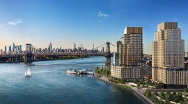 One Williamsburg Wharf rises along Brooklyn's East River, offering sweeping views of the Manhattan skyline.